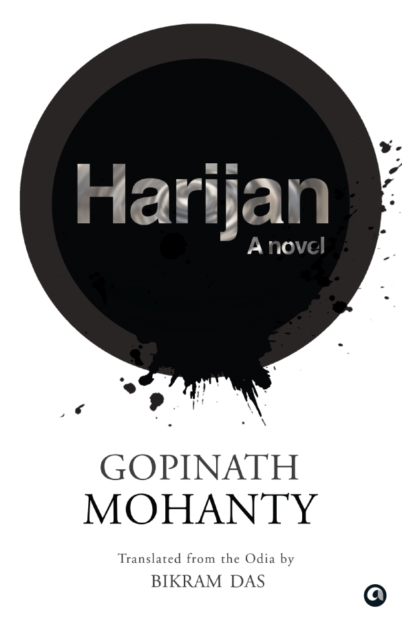The white cover of Harijan by Gopinath Mohanty, with a splash of black paint on it. 